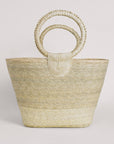 Rosita Palm Straw Tote: Hand-woven, light palm fiber tote bag with circular handles.