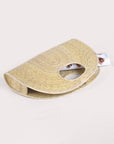 Light palm straw Concha Palm Tote, half-circle design, hand-woven natural palm fiber, inner magnet closure.