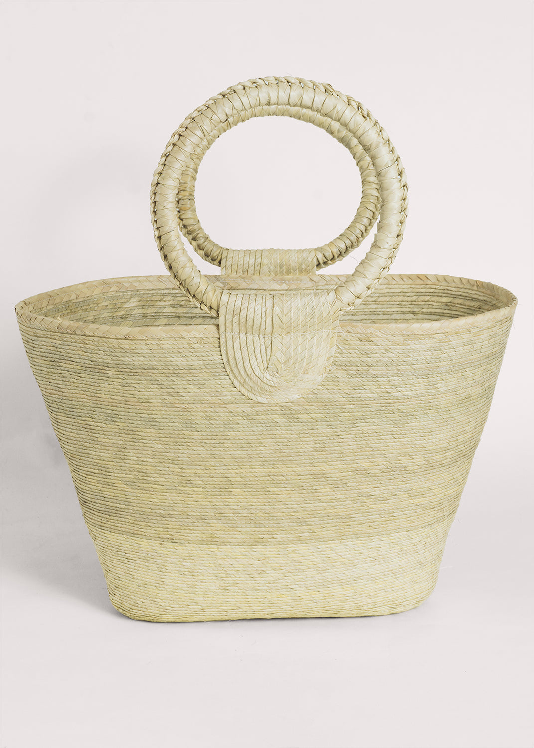 Rosita Palm Straw Tote: Hand-woven, light palm fiber tote with circular handles.