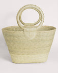 Rosita Palm Straw Tote: Hand-woven, light palm fiber tote with circular handles.